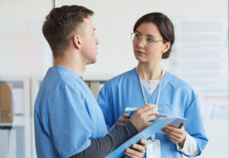 two nurse talking to each other