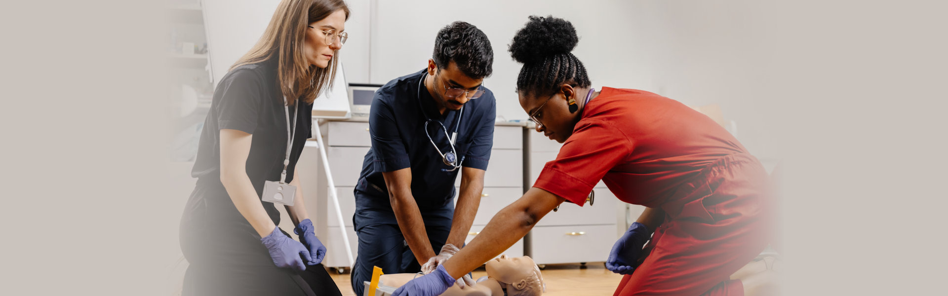 Medical students practicing cardiopulmonary resuscitation during training